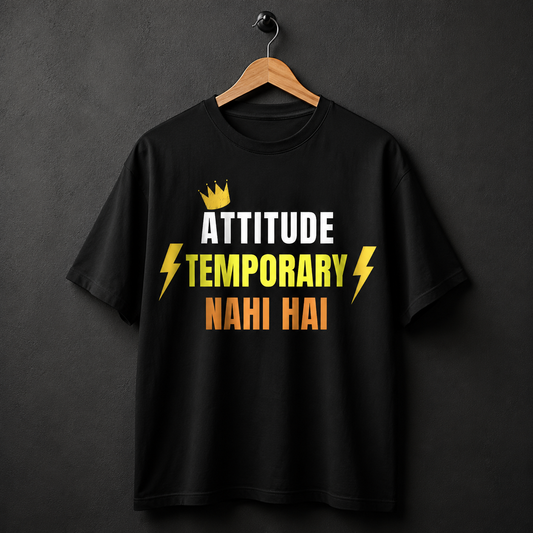 Black t-shirt with motivational text on a hanger against a dark background